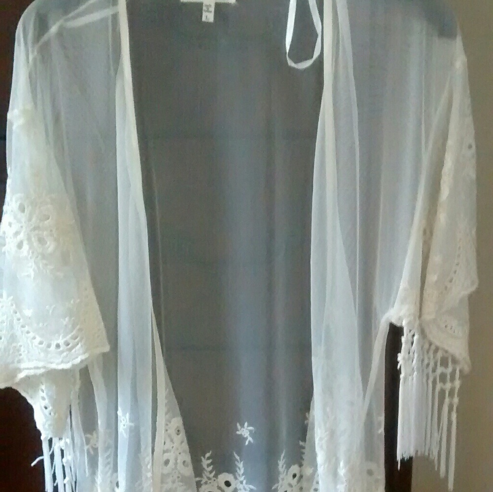 Monteau sheer cover with embroidery and fringe